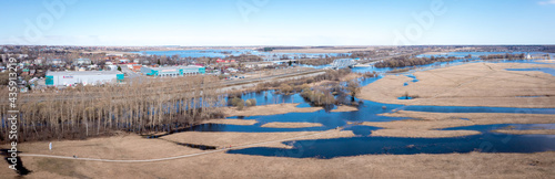 Aerial panorama of the city of Vladimir and fields with the flooded rivers Klyazma and Nerl. Spring landscape.