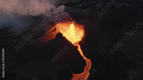 Drone over crater of erupting volcano, Iceland. Aerial static view photo