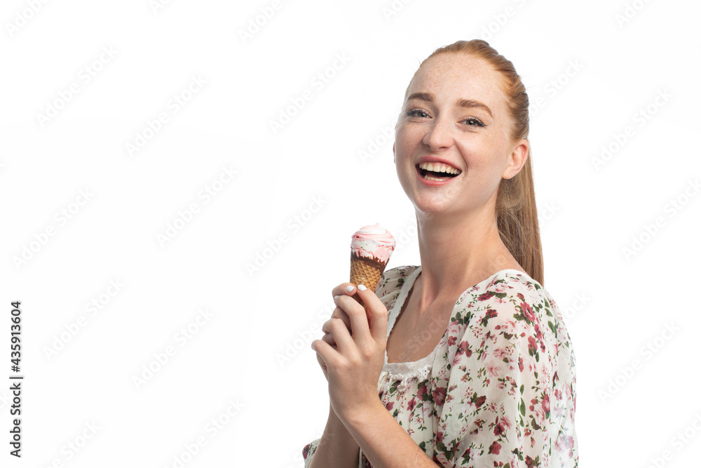 Red hair model eating ice-cream in studio Red hair model eating ice-cream in studio