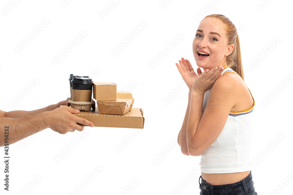 Young beautiful red hair model receive food from delivery service Young beautiful red hair model receive food from delivery service