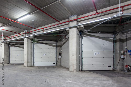 Fototapeta Numbered loading docks in a warehouse