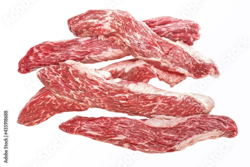 Raw Tenderloin Beef Steaks or Skirt Steak Isolated On White Background, Overhead View. Set Of Beef Steaks for Grilling or Frying. Uncooked Machete Steak or Bavet Steak On White Background.