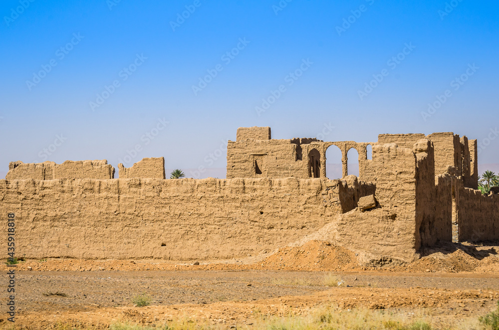 Erfoud, Morocco - April 15, 2015. Ruins of muddy buildings