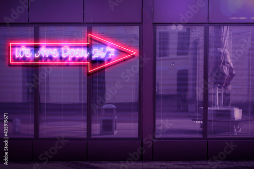 we are open 24/7 hours neon sign on the wall, night life illuminated glow