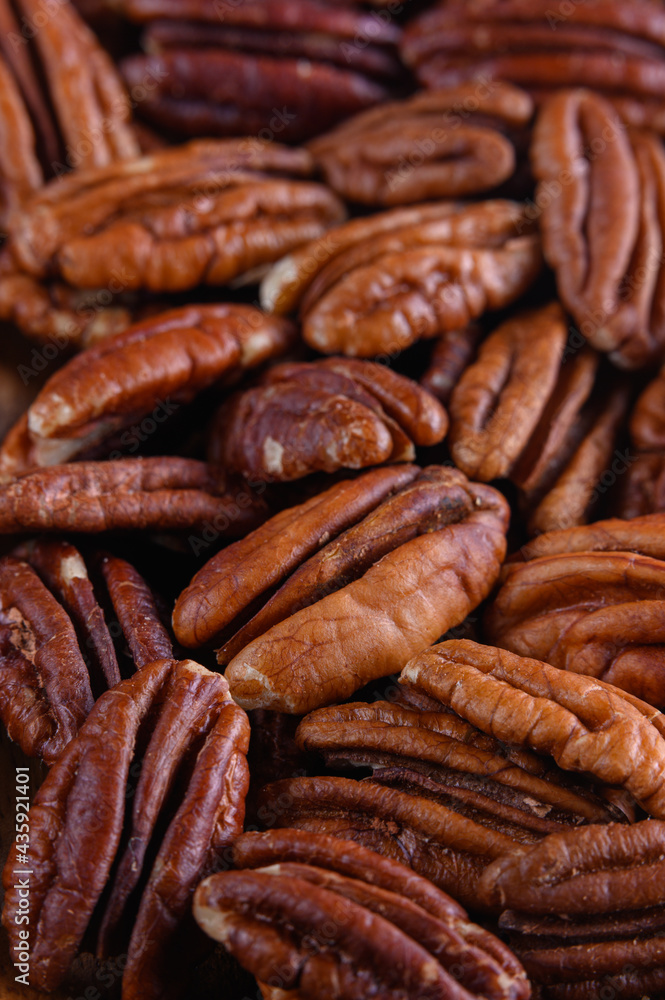 pecan nuts background vertical close-up hd pecan nuts background vertical close-up hd