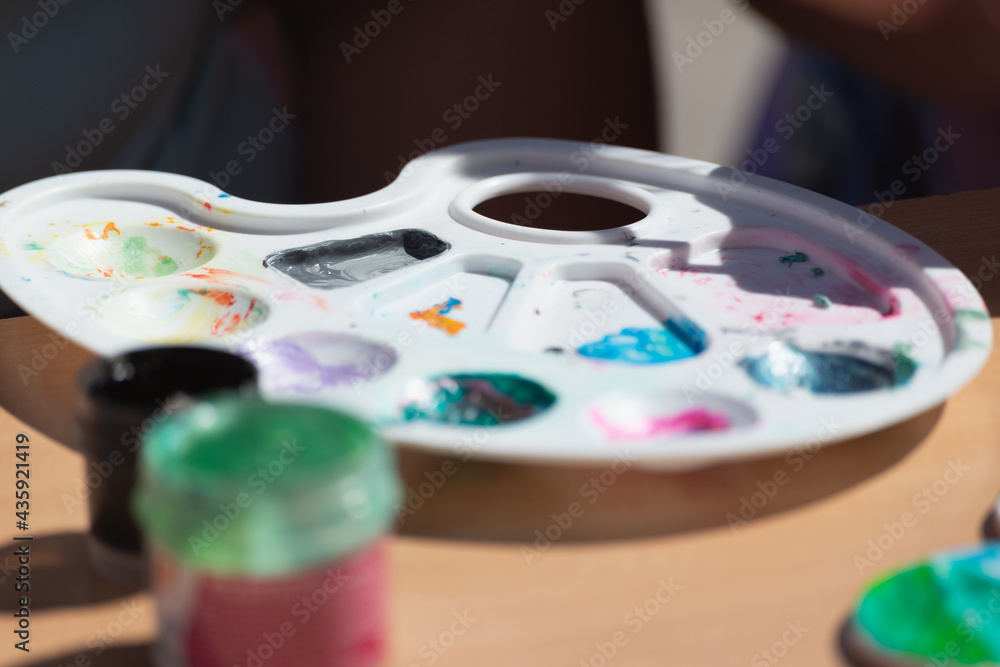 Artist desktop and paint palette. Artist desktop and paint palette.