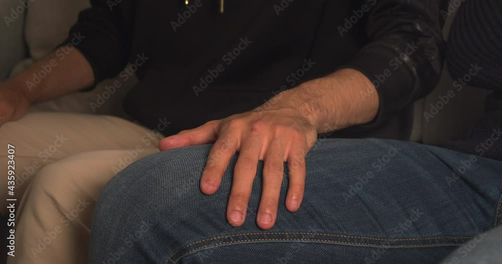 A supportive hand on someones leg A supportive hand on someones leg
