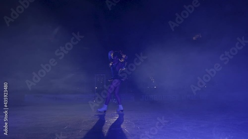 ice skating woman bows after show photo