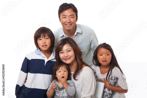 Japanese family smiling at the camera