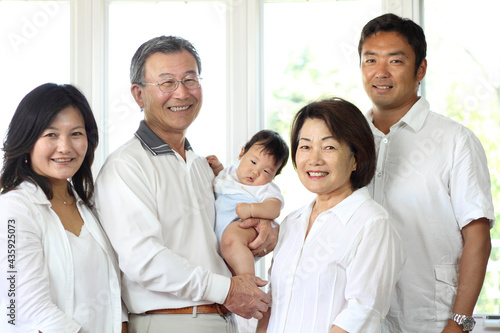 Japanese 3rd generation family smiling at the camera