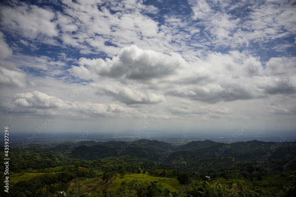 Hanging clouds natural blue sky landscape mountain