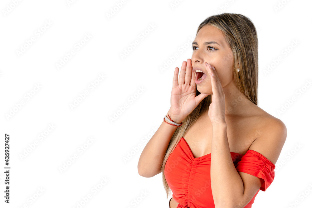 Attractive Latin woman screaming with her hands at the sides of her mouth on a pure white background. Studio photography. Attractive Latin woman screaming with her hands at the sides of her mouth on a pure white background. Studio photography.