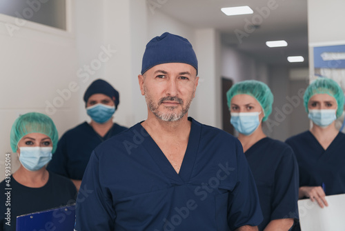  orthopedic doctor working together with his multiethnic team 