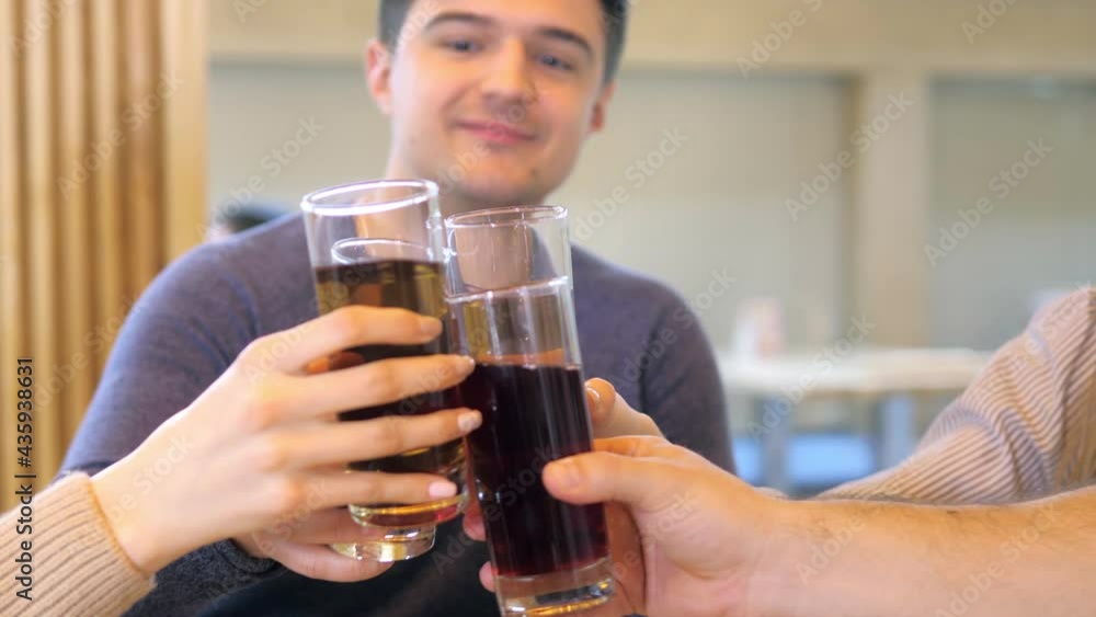 Happy friends eat pizza together, sitting at the pizza shop's copy table. Smile Happy friends eat pizza together, sitting at the pizza shop's copy table. Smile