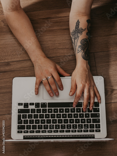 typing on laptop
