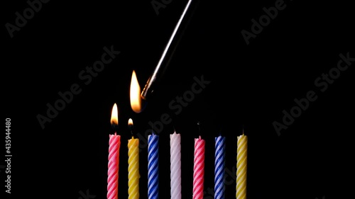 birthday candles on black background, 4k stock footage