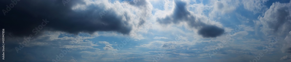 Panorama blue sky background with storm and tiny clouds Panorama blue sky background with storm and tiny clouds
