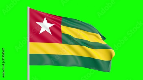 National Flag Of Togo Waving In The Wind on Green Screen With Alpha Matte photo