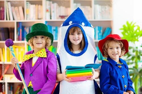 Kids in book character costume. School party. photo