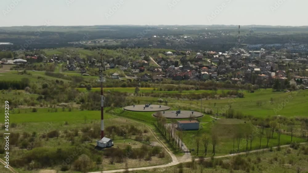 Cell Tower in Olkusz outskirts overlooking the skyline, Poland - Aerial Cell Tower in Olkusz outskirts overlooking the skyline, Poland - Aerial