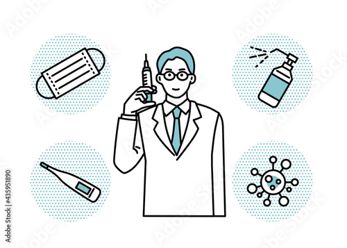 注射器を持つ男性医師　予防接種