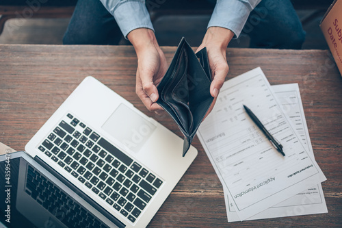 Photography Office worker lost his job and open a wallet without money