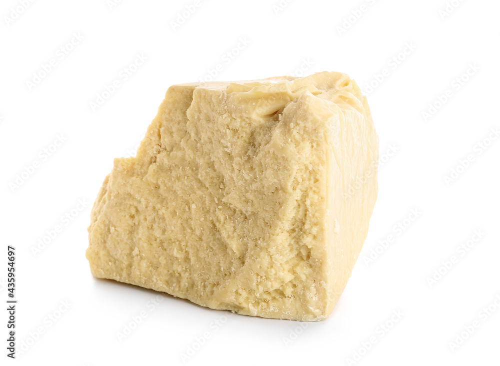 Piece of cocoa butter on white background Piece of cocoa butter on white background