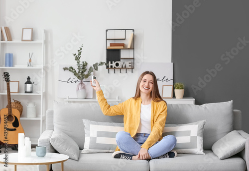 Beautiful young woman with ...