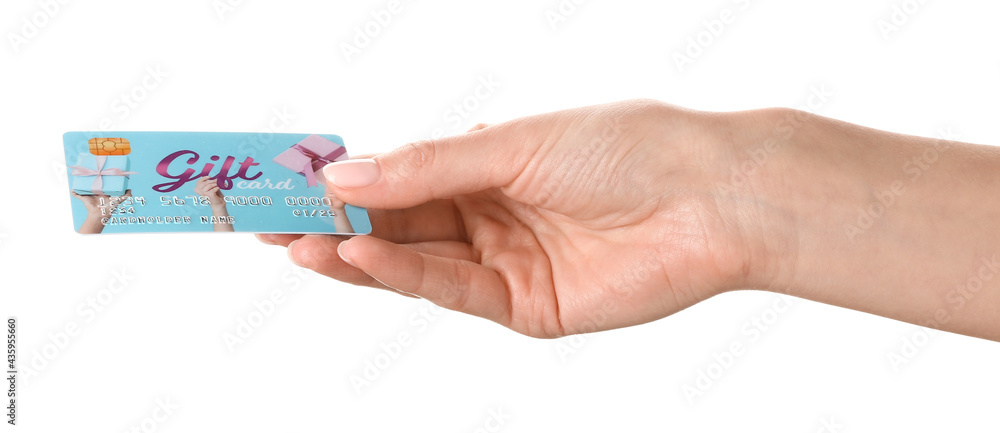 Female hand and gift card on white background Female hand and gift card on white background