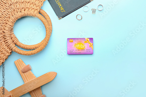 Composition with gift card on color background photo