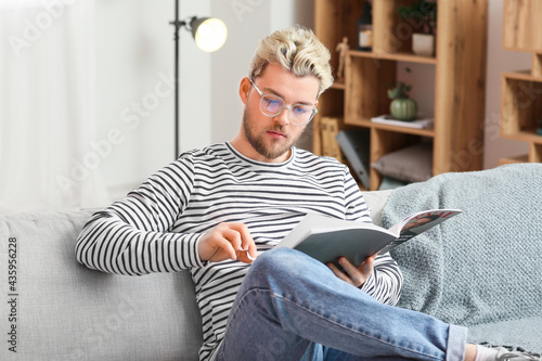 Young man wearing glasses w...