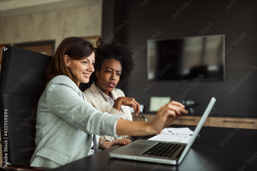 Reading something online, making notes. Reading something online, making notes.