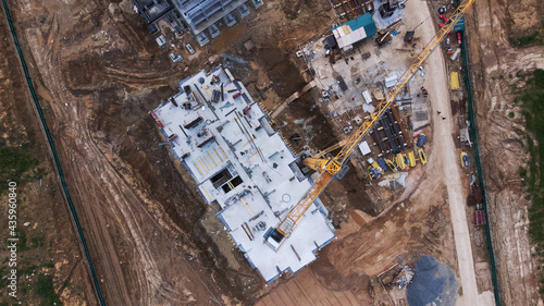 Modern urban development. Construction site with multi-storey buildings under construction. Construction work is underway. Aerial photography. © f2014vad