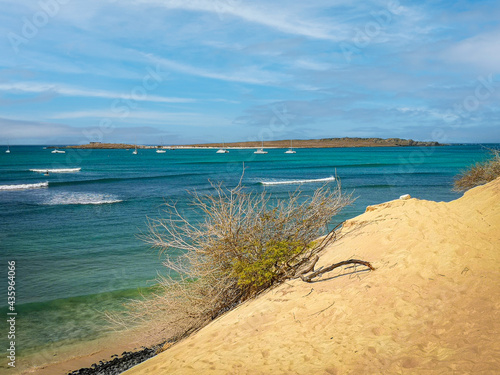 Cloudy sky over Atlantic Ocean in Cape Verde. African Island in summer. Blue water, sandy beach, hot weather. Selective focus on the horizon, blurred background.