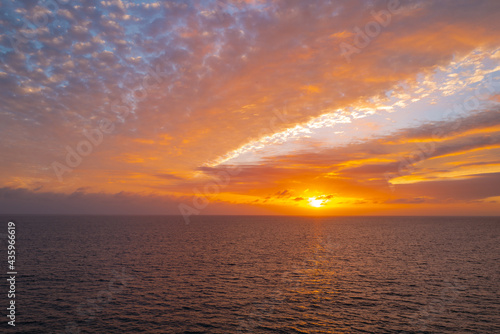 Fototapeta Naklejka Na Ścianę i Meble -  Sunset at the sea. Sunrise at beach. Colorful ocean beach sunrise, miami.
