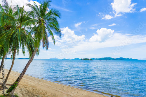 Coconut trees on the beach © oopsurasak