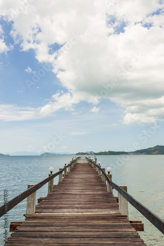 Wooden bridge to the sea