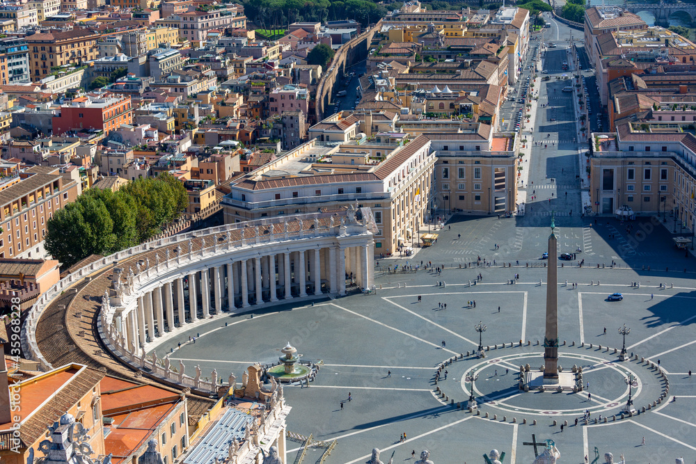Fototapeta premium Aerial view on St.Peter's Square from dome of Saint Peter's Basilica. Few tourists due to the Covid-19 coronovirus pandemic, Vatican, Rome, Italy