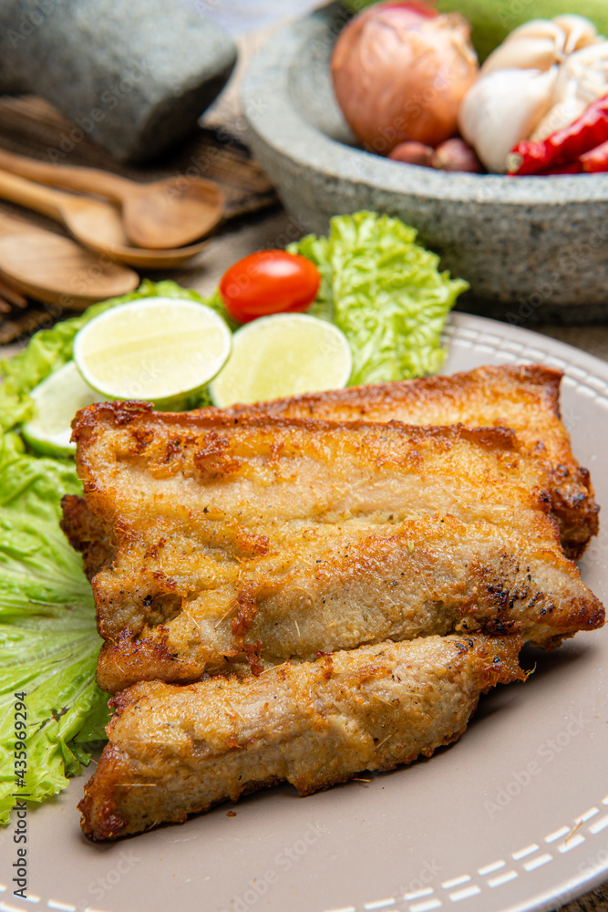 Delicious and crispy Samcan Goreng or Fried Pork Belly from medan - north sumatra