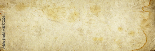 Old paper texture. Rough faded surface. Blank retro page. Empty place for text. Panoramic background for vintage style design. © Andrei Stepanov