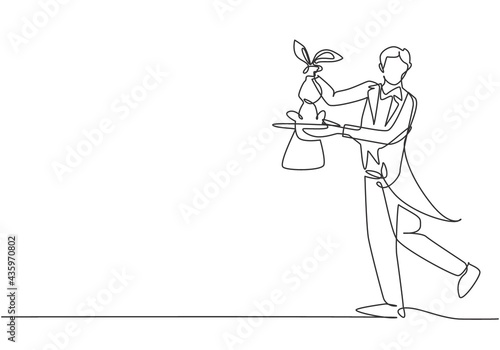 Single continuous line drawing the magician puts on a show by getting a rabbit out of his magic hat. Very impressive magic show that night. Dynamic one line draw graphic design vector illustration.