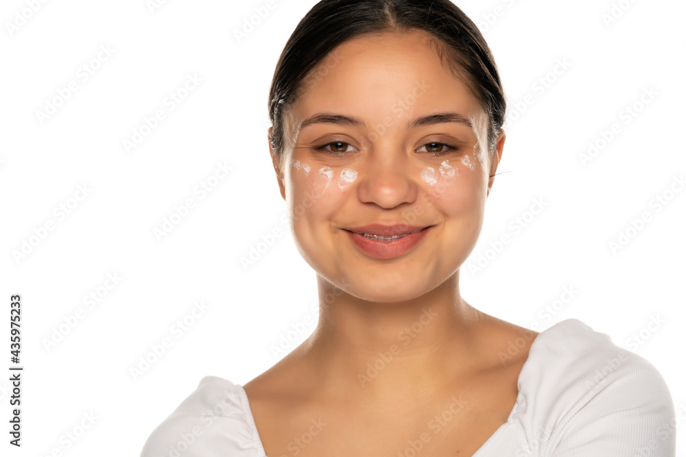 woman posing with facial cream woman posing with facial cream