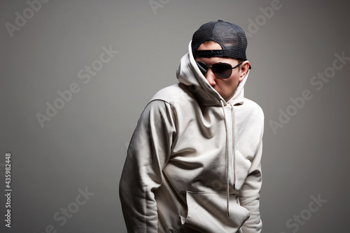 Man in Hood, Hat and sunglasses © eugenepartyzan