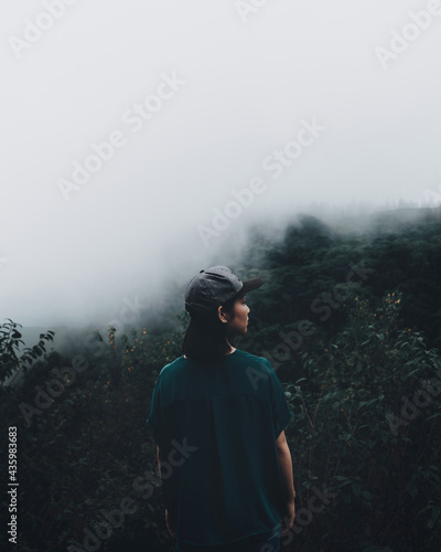 young Japanese cute teen girl brunette portrait women tourist adult woman asian mature looking the sky outdoors on a hike mountains camping in mist fox at Doi Inthanon, Chiang Mai, Thailand.