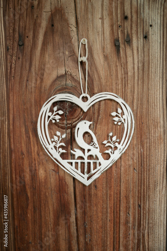 white bird in heart decoration at wedding