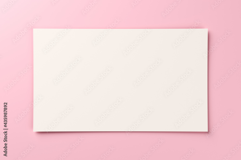 Blank white gift card on pastel pink background with copy space. 3D rendering Blank white gift card on pastel pink background with copy space. 3D rendering