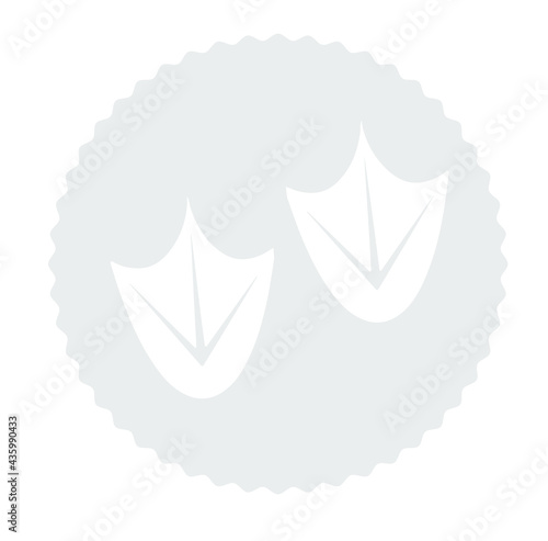 The contour image of the footprints of a goose in white on a gray background in the form of a circle with a wavy frame