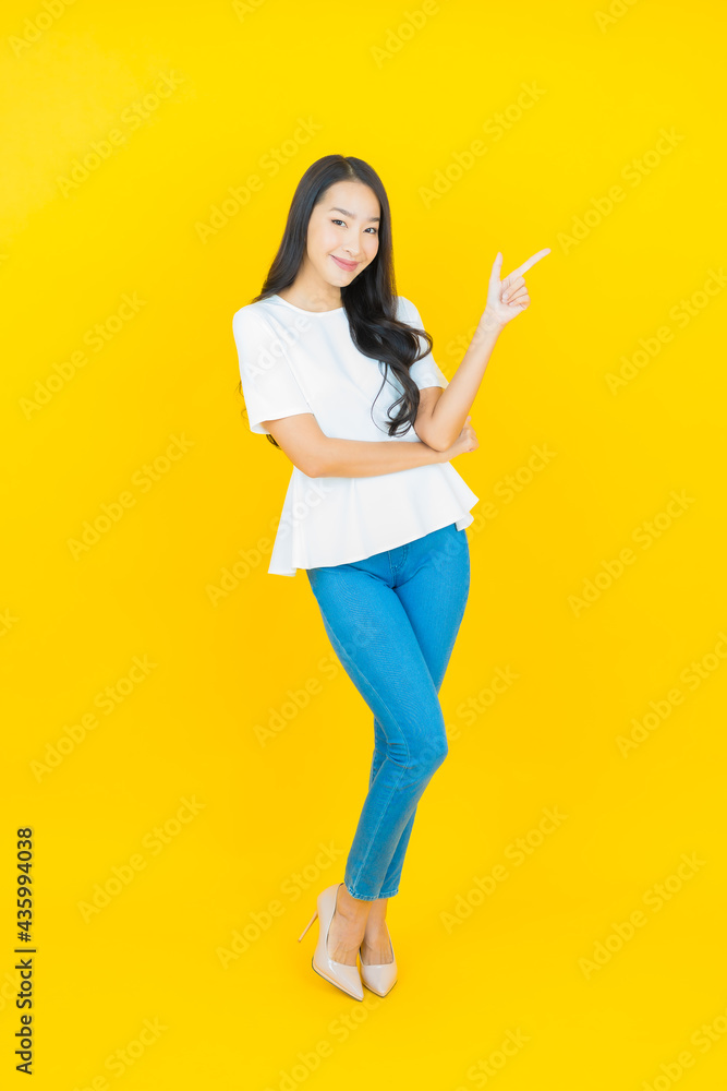 Portrait beautiful young asian woman smile with action Portrait beautiful young asian woman smile with action