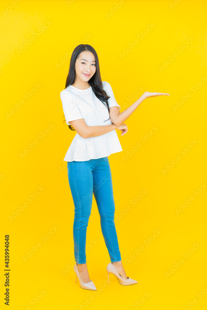 Portrait beautiful young asian woman smile with action Portrait beautiful young asian woman smile with action