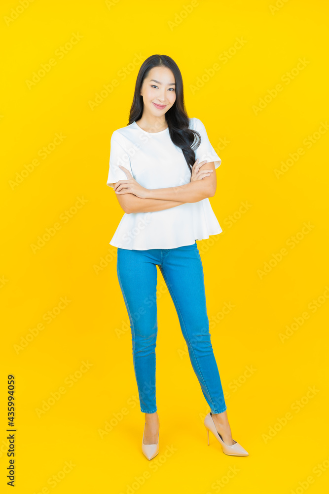 Portrait beautiful young asian woman smile with action Portrait beautiful young asian woman smile with action